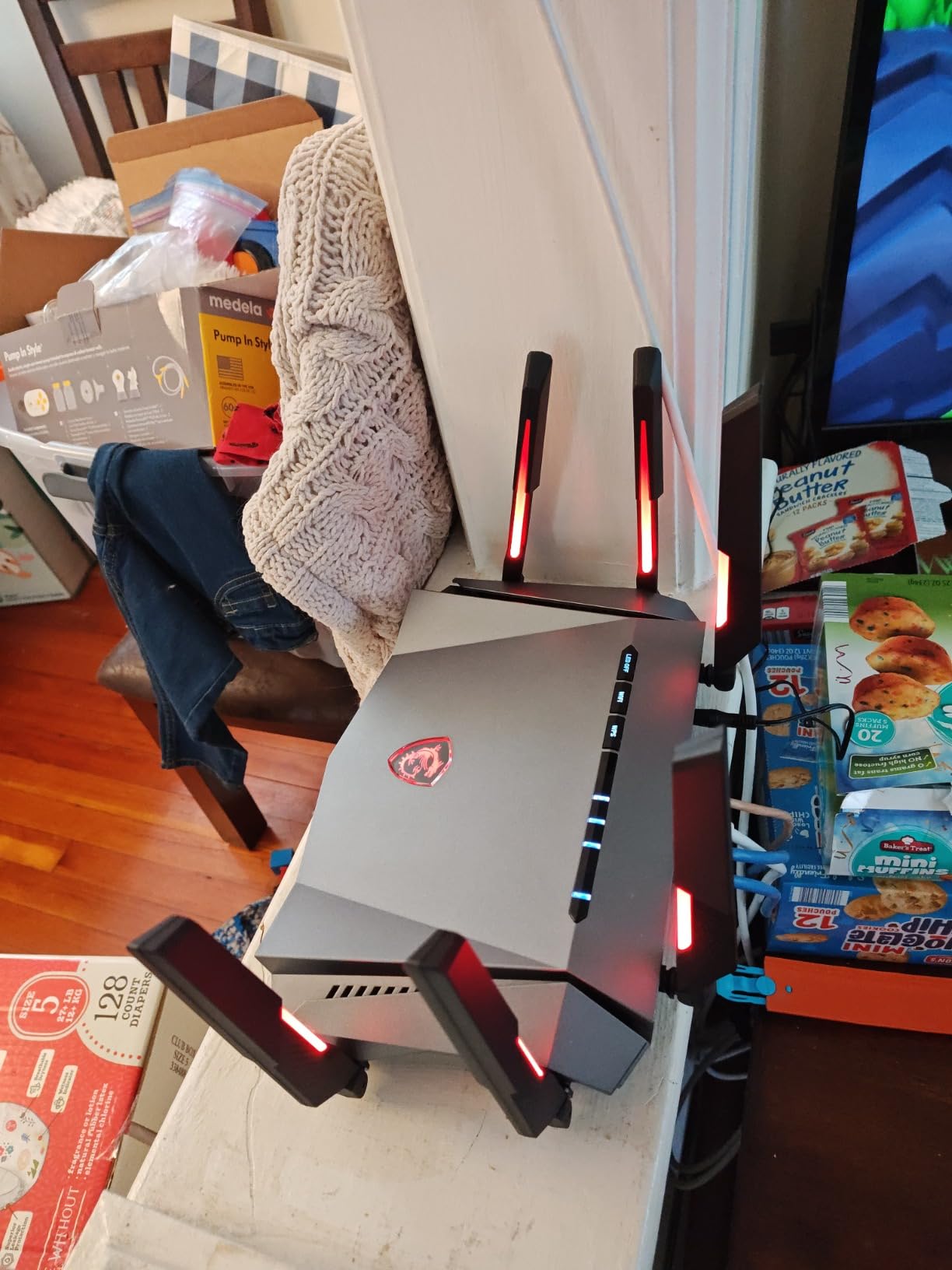 MSI Radix AXE6600 WiFi 6E Tri-Band Gaming Router, AI QoS, RGB, 1.8GHz Quad-Core customer photo 1