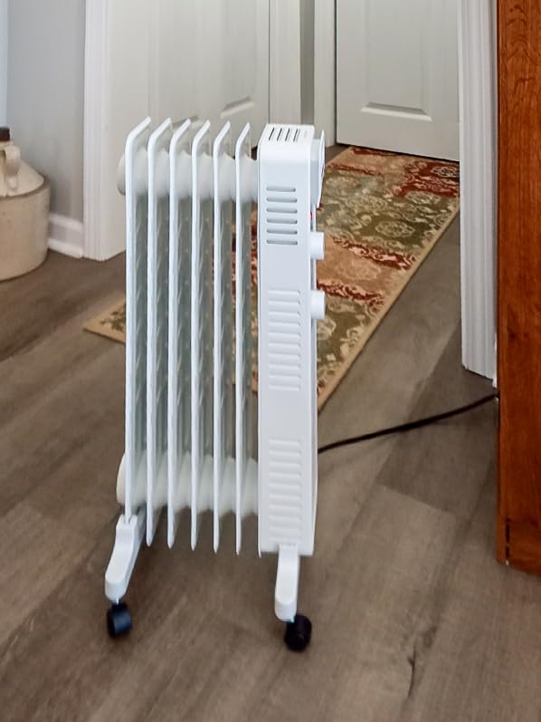 Pelonis Oil Filled Radiator Heater for Large Space, 2025 Upgraded, Space Heaters with 1500W Quiet Warmth Radiant Heater, 3 Heating Modes, Overheat & Tip-Over Protection, Adjustable Thermostat, Black customer photo 1