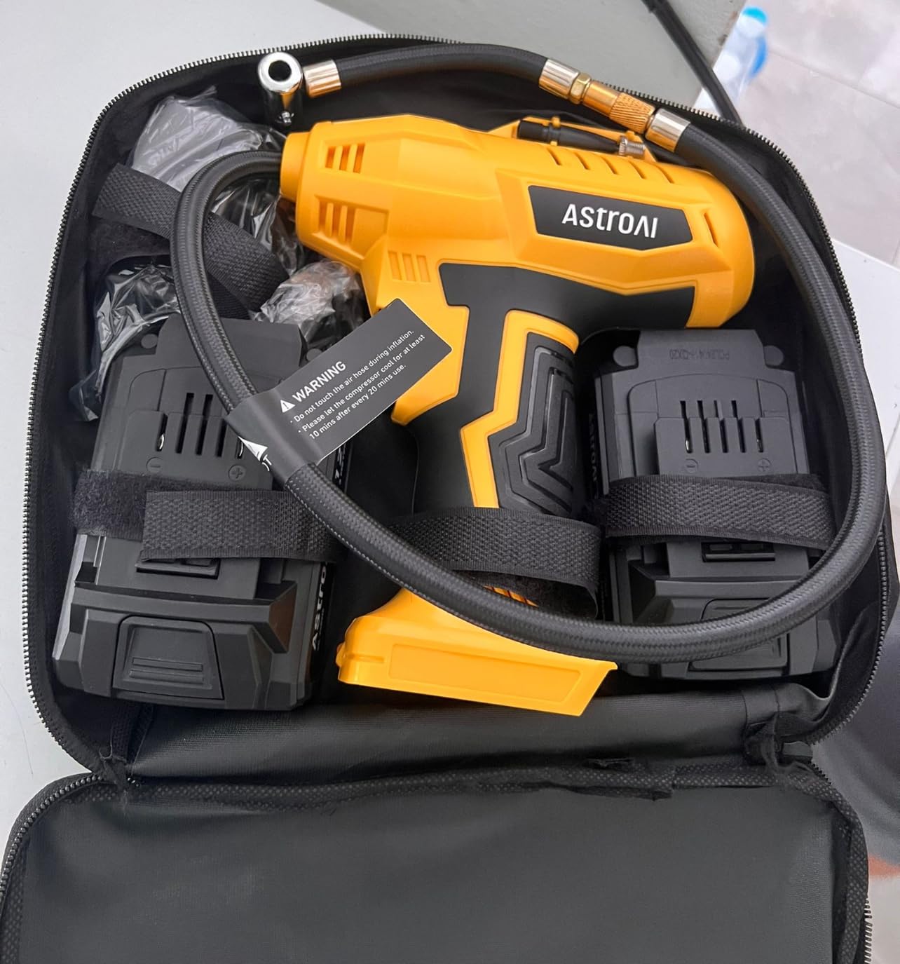 AstroAI Cordless Tire Inflator Portable Air Compressor 160PSI 12VDC Battery | Dual Power Supply Auto Shut-Off Digital Pressure Gauge Fast Inflation Air Pump for Cars Motorcycles Bikes Ball Gift Yellow customer photo 2