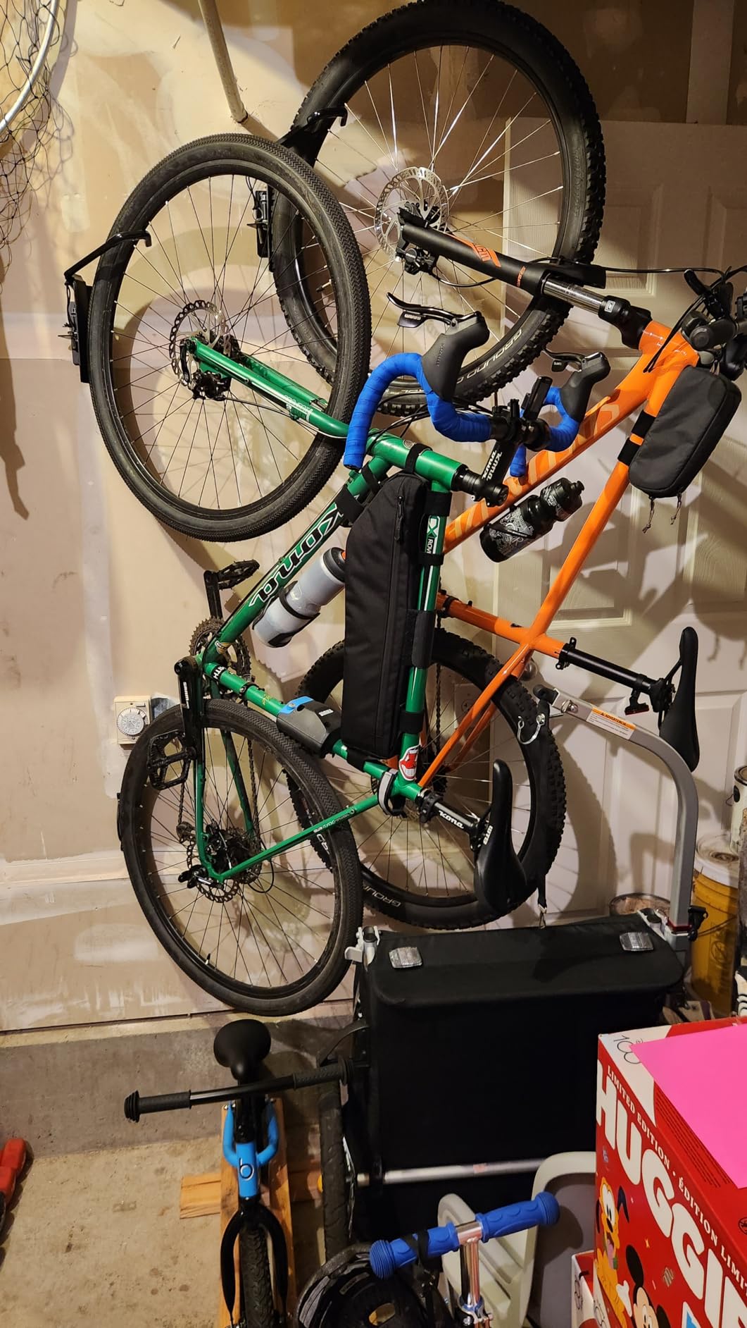 StoreYourBoard Bike Hangers for Garage | Garage Bike Rack Wall Mount, Vertical Bicycle Rack for Garage | 124° Swivel Bike Wall Mount with Stopper, Holds 50lbs, Fits All Wheel Diameters, Max 2.6