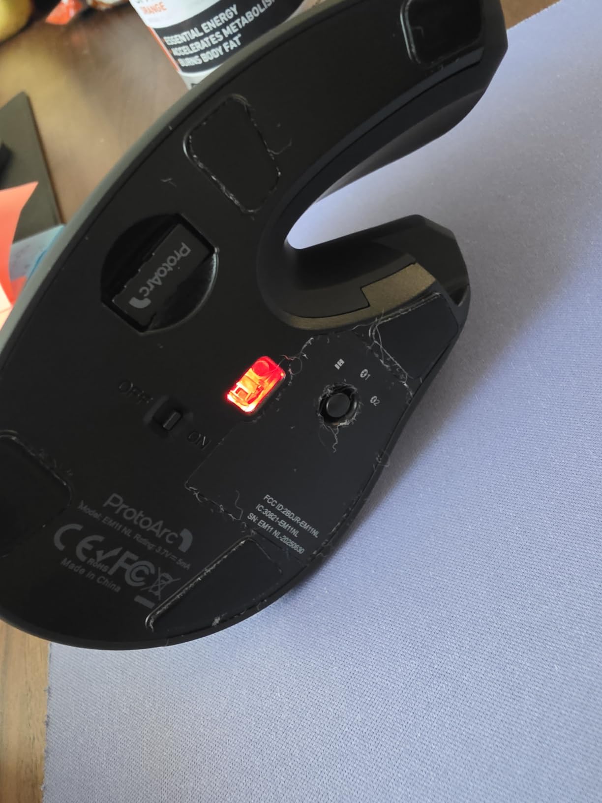 ProtoArc EM11 NL Wireless Ergonomic Vertical Mouse, Rechargeable, Black | 58 degree vertical design supports a natural wrist posture, connect 3 devices via Bluetooth/2.4G USB-A, 500mAh USB-C rechargeable. customer photo 1