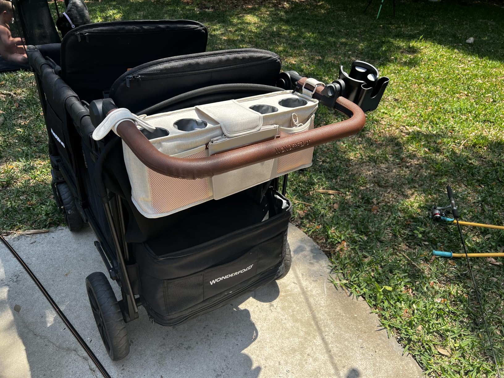 WonderFold W4 Luxe Pro Stroller Wagon - Collapsible Stroller Wagon with Aluminum Frame - Adjustable Canopy & Push Handle - XL All-Terrain Wheels - For Babies, Toddlers & Kids - 4 Seater - Black customer photo 1