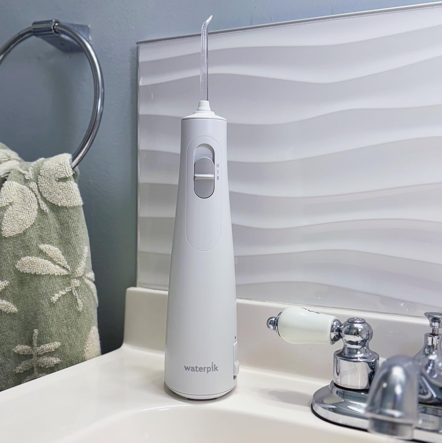 Waterpik Cordless 1100 Rechargeable Portable Water Flosser for Teeth Cleaning, Travel, Braces Care, ADA Accepted, WF-30CD White customer photo 1