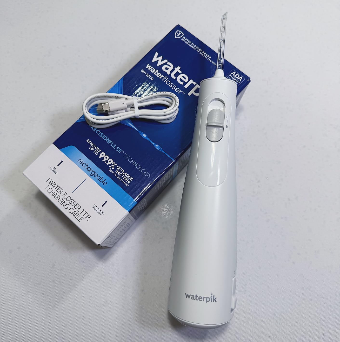 Waterpik Cordless 1100 Rechargeable Portable Water Flosser for Teeth Cleaning, Travel, Braces Care, ADA Accepted, WF-30CD White customer photo 2