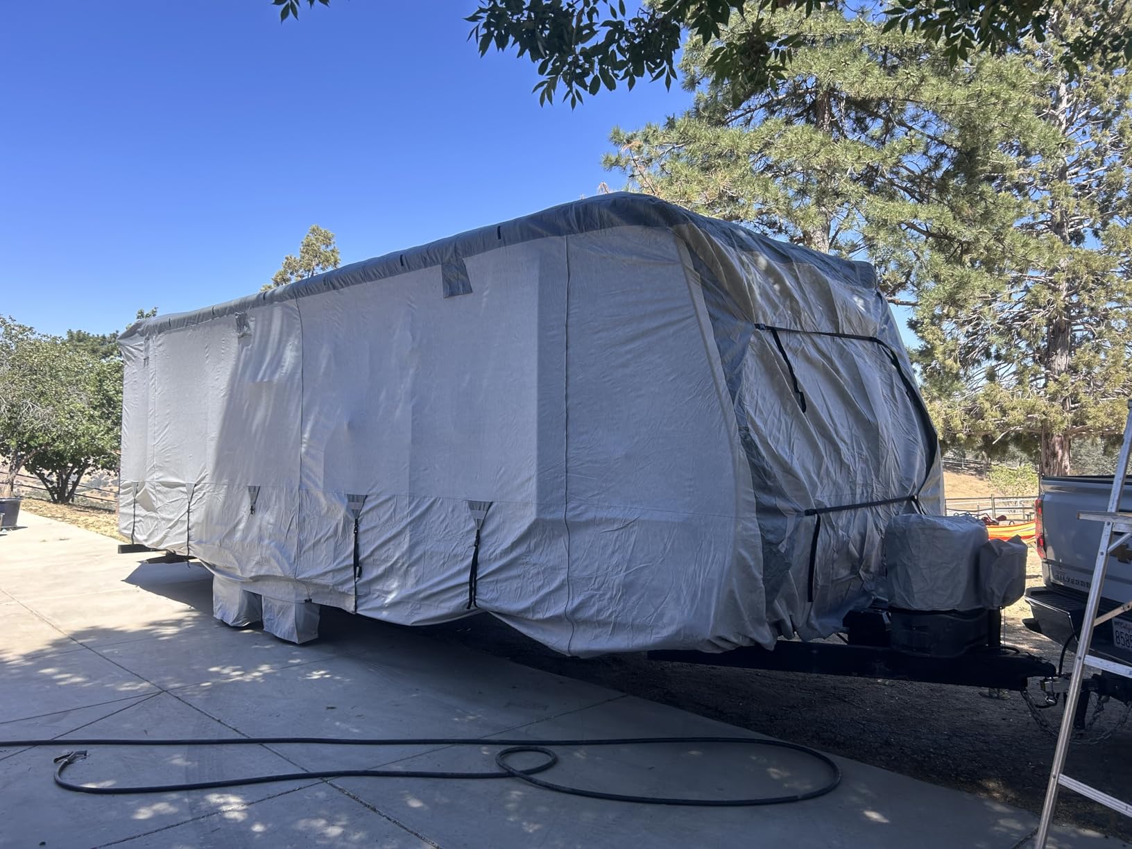 Mofeez Travel Trailer RV Cover 7 Layers for 30'-33' Camper Cover | Extra-Thick Windproof Waterproof Rip-Stop Camper Covers with Adhesive Repair Patches, 2Pcs Extra Straps & 4 Tire Covers customer photo 2