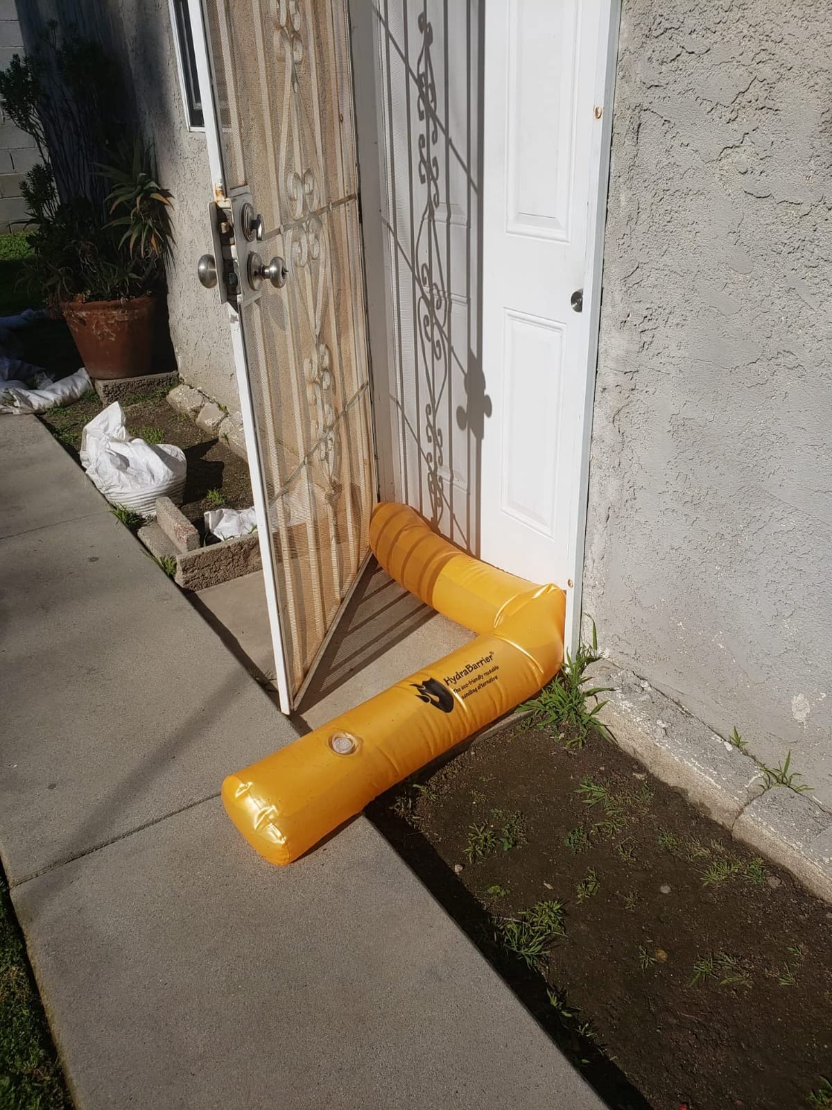 The Original HydraBarrier Standard Flood Barrier – 6 ft Long x 4 in High – Light, Reusable Sandbag Alternative – Flood Control & Diversion Tube for Home, Garage, Door & Property Protection customer photo 2