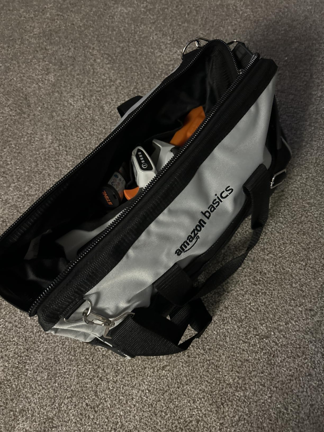 Amazon Basics Durable Wear-Resistant Tool Storage Bag with Adjustable Shoulder Strap, Portable Tool Organizer, 16 in, Black & Grey customer photo 1