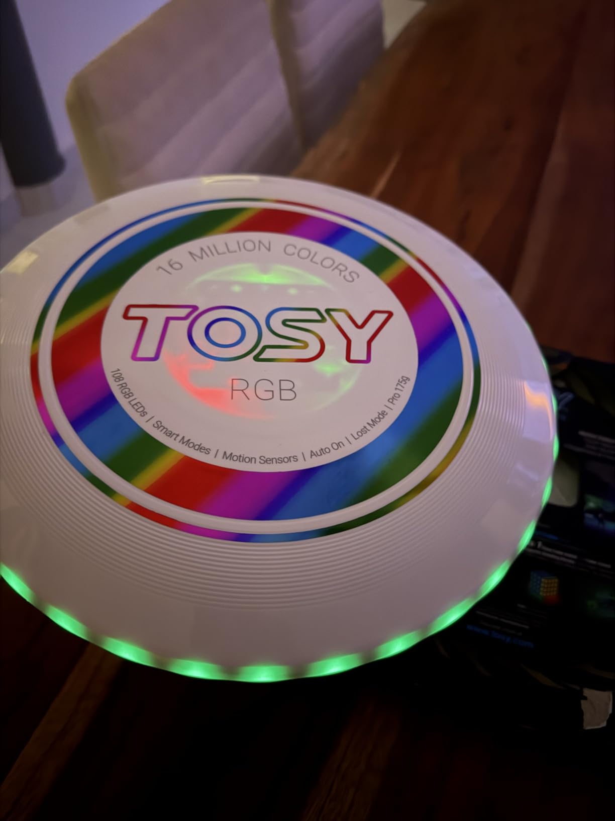 TOSY Flying Disc - 16 Million Colors RGB LEDs, Extremely Bright, Smart Modes, Camping Essentials for Teens/Kids/Adults/Men/Boys/Girls, Auto Light Up, Rechargeable, Waterproof, 175g customer photo 1