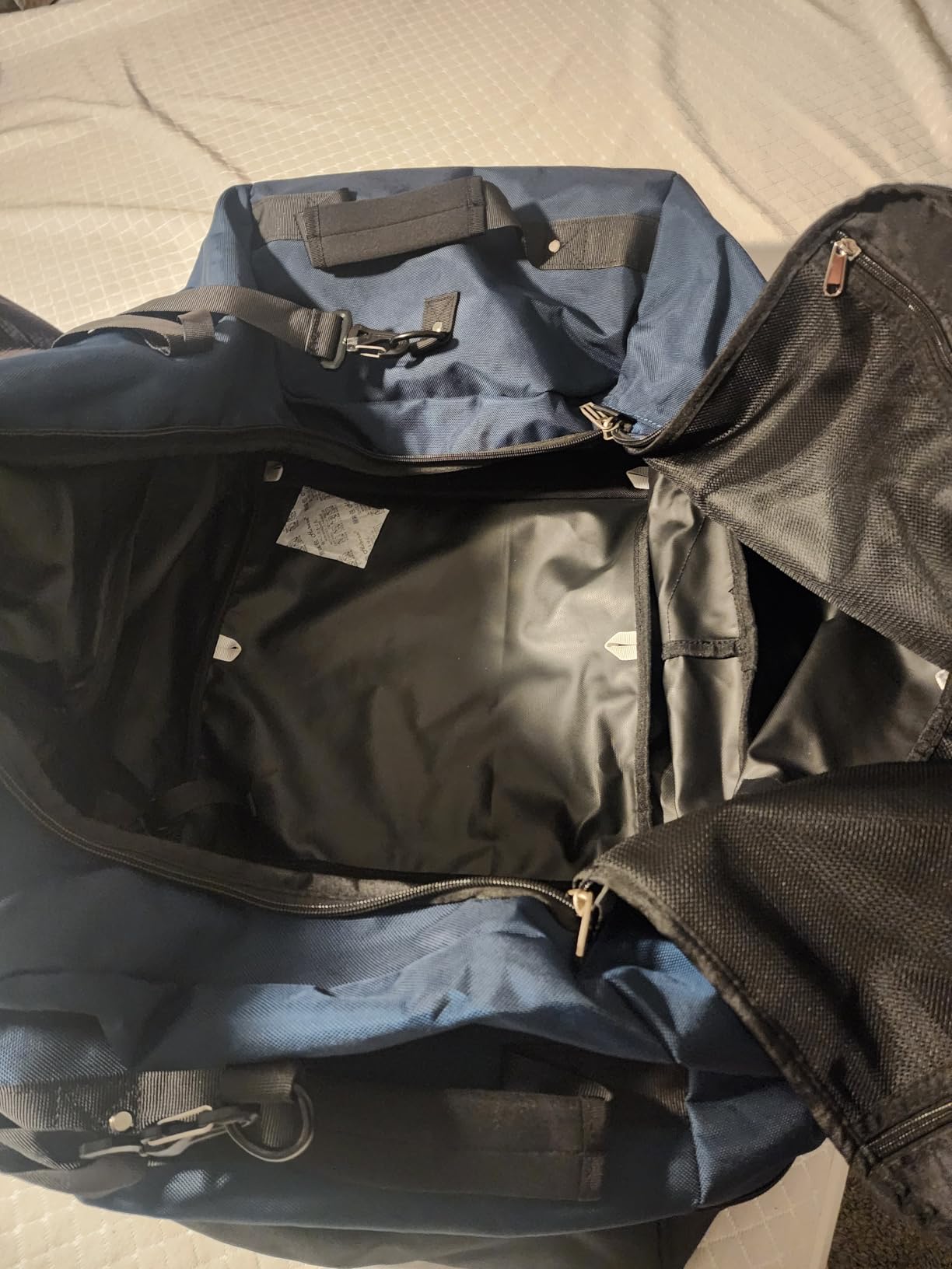 Rolling Duffle Bag with Wheels,110L/140L Expandable Soft-Sided Foldable Duffle Bag with 2 Rubber Wheels,Packable 32” Rolling Carry-On with Pockets & Compartments (Dark blue) customer photo 2
