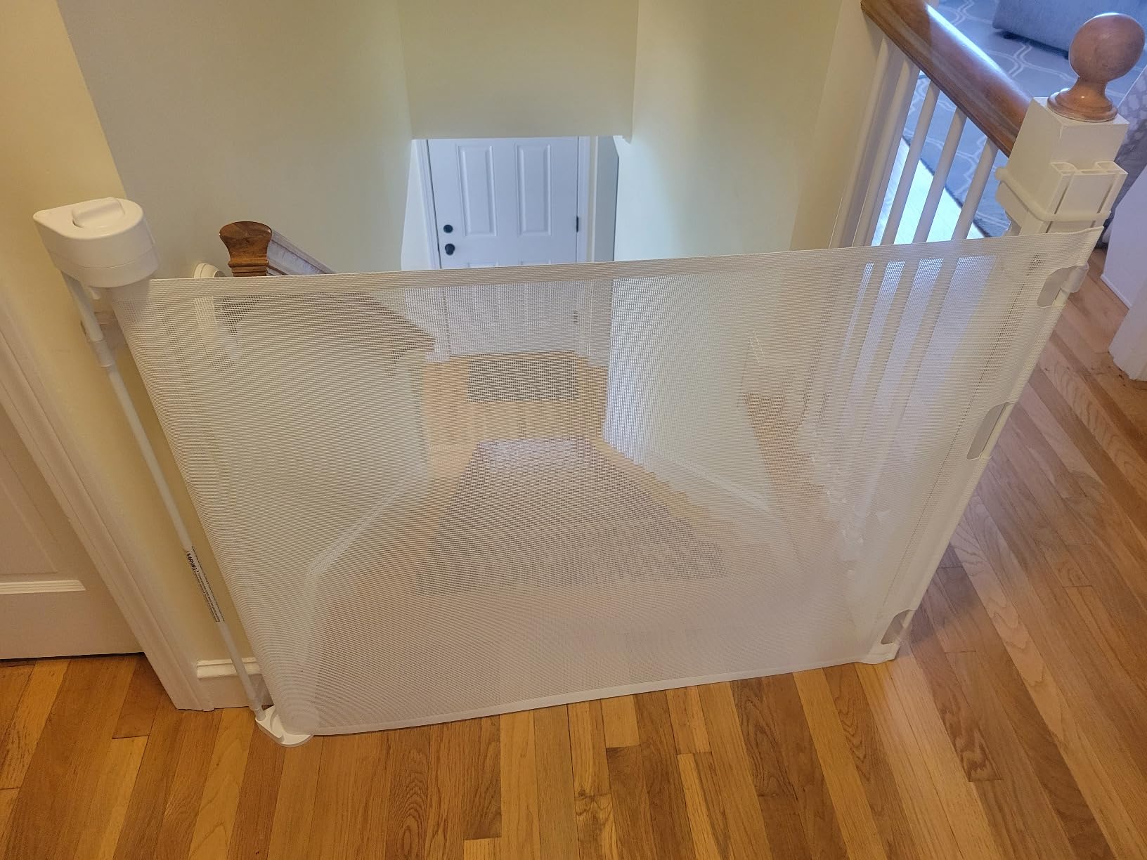 Retract-A-Gate 72 Inch White Retractable Baby and Dog Gate, Made in USA customer photo 1