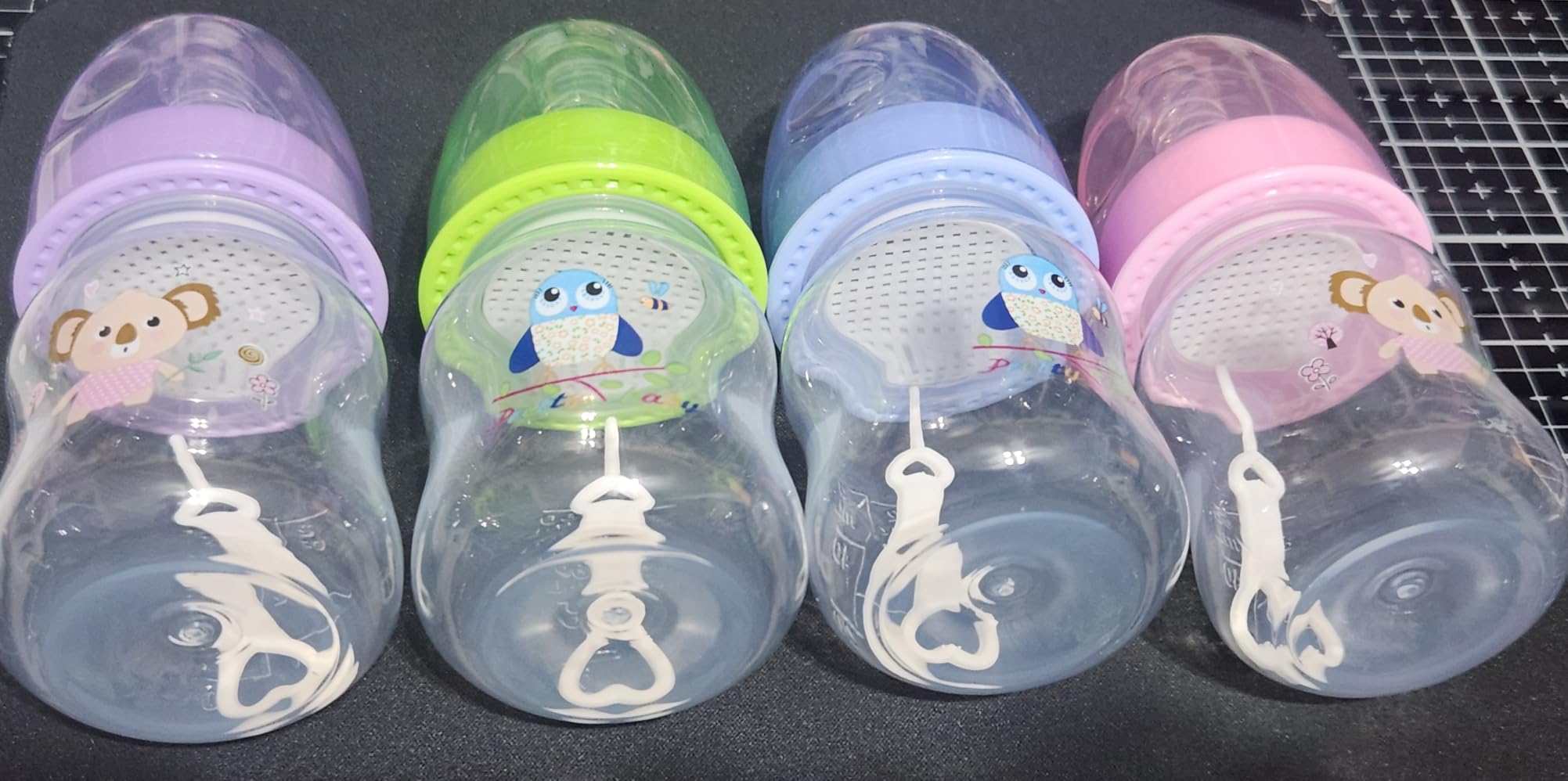 Pretty Baby 2oz (60ml) 4-Pack Anti-Colic Baby Bottles for Newborns, BPA-Free, Breastfeeding Transition, Vented for Gas & Colic Relief Ideal for Baby Registry customer photo 2