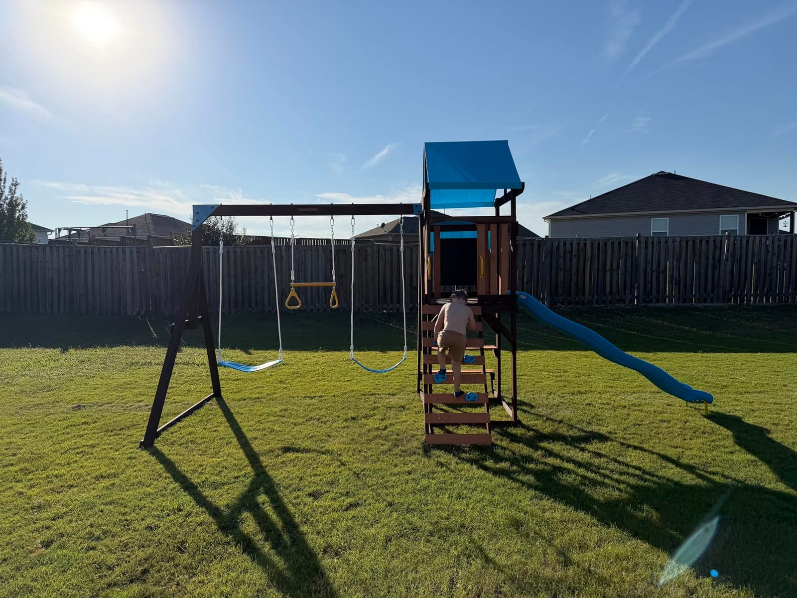 Sportspower Rosemont Cedar Wooden Swing Set with 8' Slide, 2 Adjustable Swings, Trapeze, Play Fort with Rock Climber, Sandbox, Picnic Table, Chalk Tarp & Anchor Kit, Outdoor Playset for Kids Ages 3–8 customer photo 2